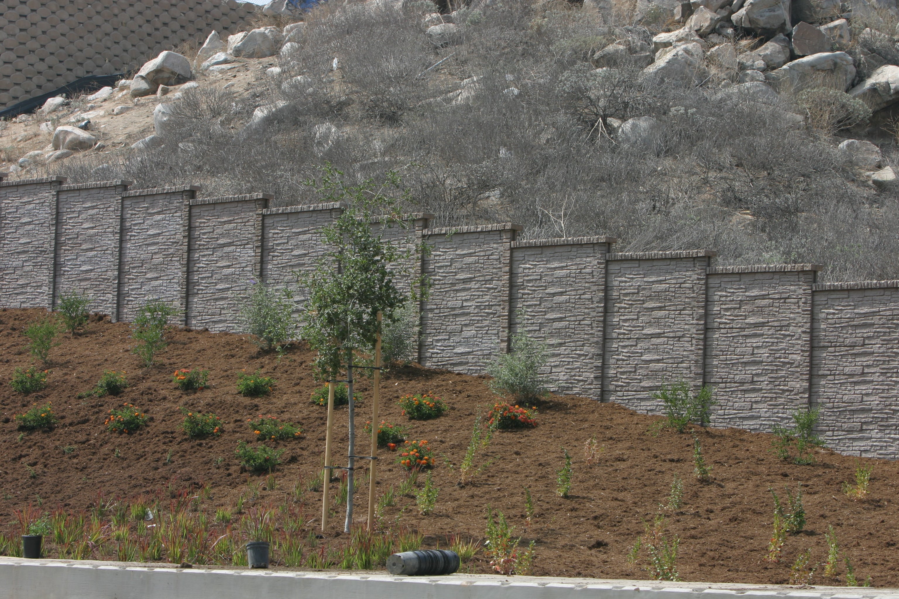 StackedStone precast fence wall